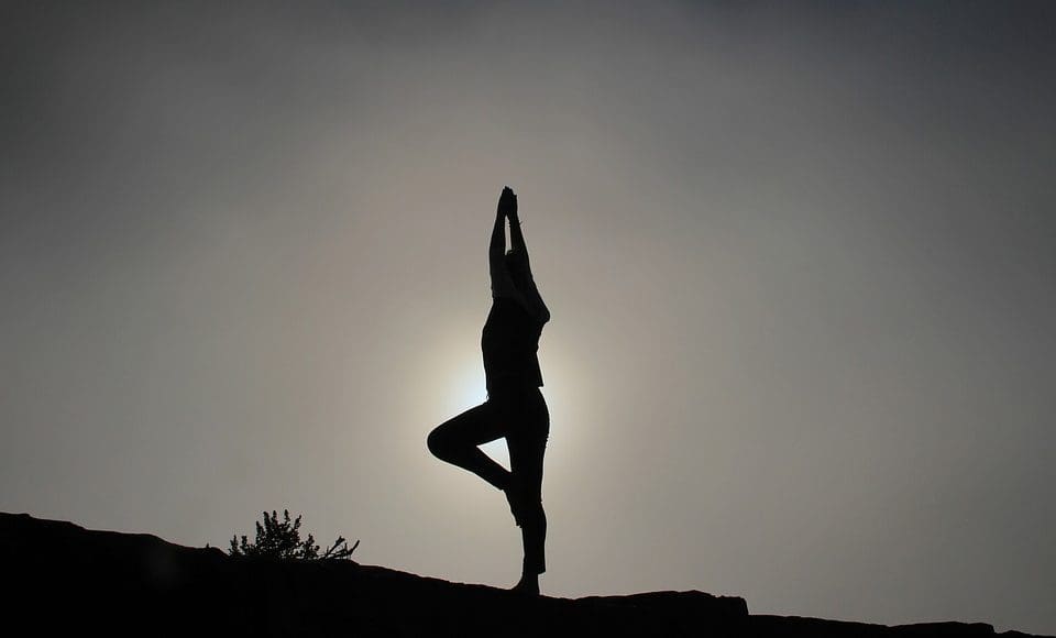 silhouette yoga standing pose