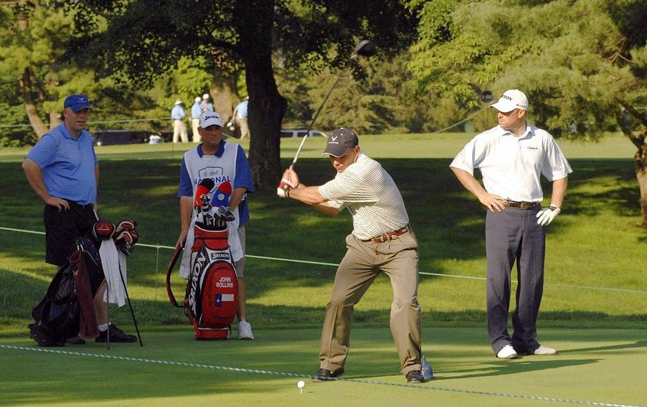 golfers playing a round